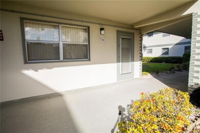 Covered Front Corner Unit Entry