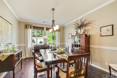 Formal Dining Room with Brazilian Walnut wood floo
