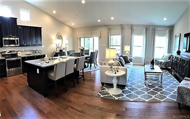 Open Concept living with Handscraped hardwood floo