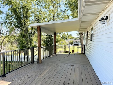 Covered deck off kitchen/dining area
