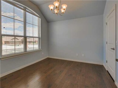 Studio/Study/Office. Study with hand scraped wood floors and a storage closet.