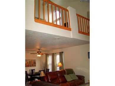 Dramatic view with upstairs loft office area!  Giv