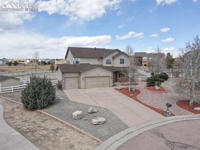 View of front property with a garage