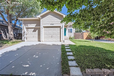 Two story home featuring a 2 car garage and a fron