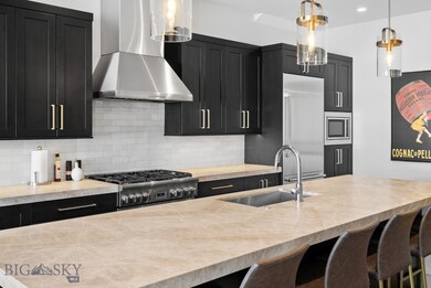 Custom backsplash, countertops & lighting