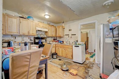 Kitchen featuring sink, stainless steel refrigerat