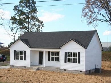 All Smart Lap Board siding with covered front porch. 1539 sqft of living area.