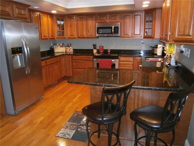 ANOTHER VIEW OF THE CHERRY KITCHEN