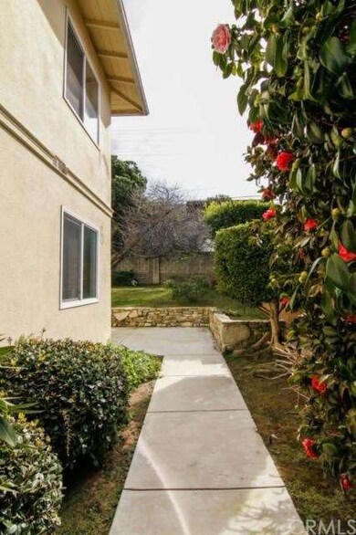 Side of the building that leads to the backyard ar