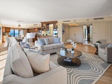 Living room with light hardwood / wood-style floor