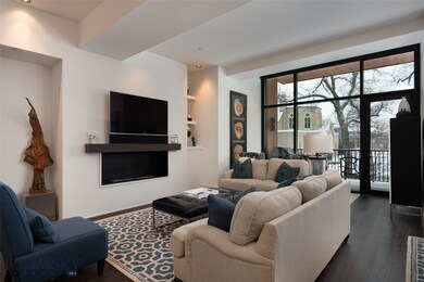 Large great room with fireplace and direct access