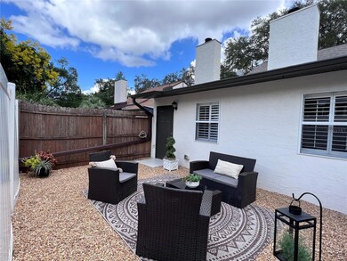 fenced-in back yard, perfect outdoor oasis for relaxing and entertaining.