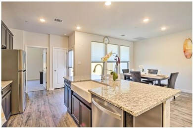 Kitchen with appliances with stainless steel fini