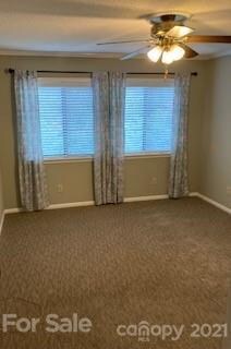 Bright bedrooms with ceiling fans