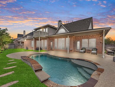 Beautiful pool and large back covered patio with TV included.