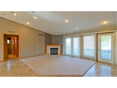 Inviting family room area with fireplace.