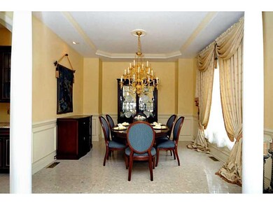 Dining Room. The formal dining room includes marbl