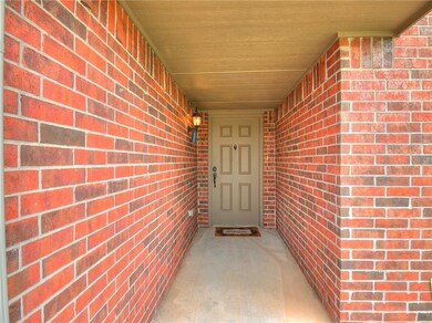 Front walk of this charming property is detailed b