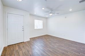 Ceiling fan, recessed lighting, wood look laminate