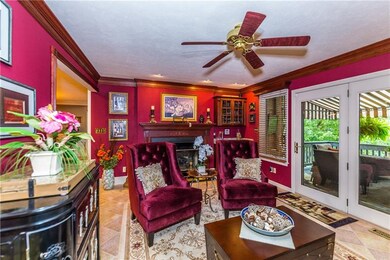 The sun room provides access to the wrap around de