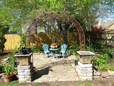 Enjoy the 2nd patio area with arched entrance!