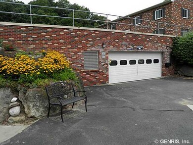 Exterior Front. Entrance to garage.
