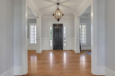Grand Foyer from family room view (Hardwoods Throuhout)