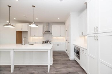 Built in microwave, Stainless steel appliances , soft close doors and drawers -  pictures represent a previously built home, not the actual home.