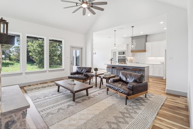 Living room featuring light hardwood / wood-style 