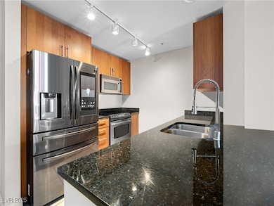Kitchen with appliances with stainless steel finis