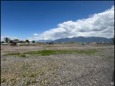 View of yard featuring a view of countryside and a mountain view