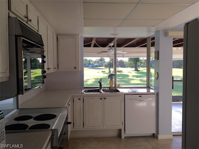 Kitchen with Eat-In Area - Sliding Glass Doors to 