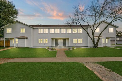 A charming quadplex townhome condo nestled in a qu