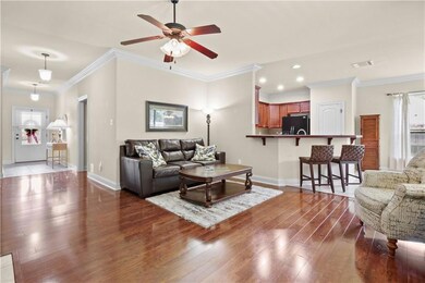 Living Room with Kitchen  and Foyer views