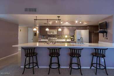Sleek kitchen with bar seating