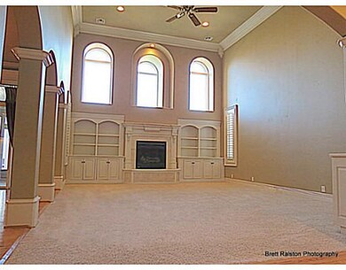 Living Room. Gas log fireplace, high windows, wet