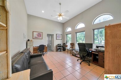 Formal living room currently used as an office