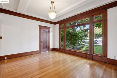 Empty room featuring baseboards and light wood-style flooring