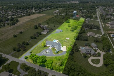 Over 7 Acres of Gorgeous Landscape with Mature Trees