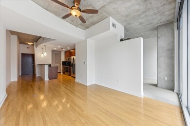 Unfurnished living room featuring light wood-type