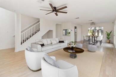 Living room featuring light wood-style flooring, 