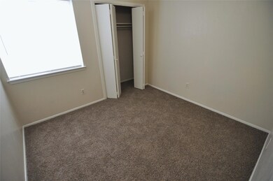 Unfurnished bedroom featuring carpet flooring, a 