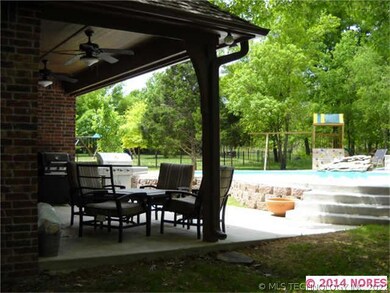 Bring your grill and enjoy this covered back patio