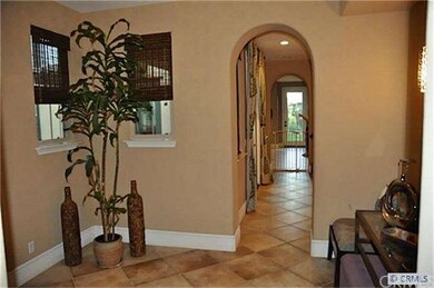 Foyer looking through arches into Bonus Room