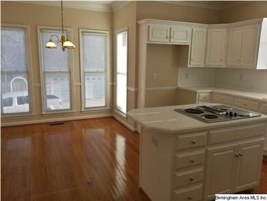 Kitchen has breakfast area.