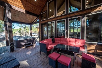Sunroom / solarium with wooden ceiling and lofted 