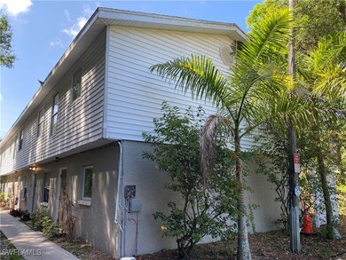 View of side of property with stucco siding