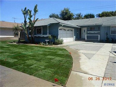 Long driveway to attached 2 car garage