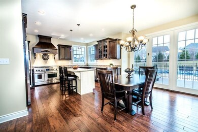 Wide plank, hand scraped hardwood floors in entry,