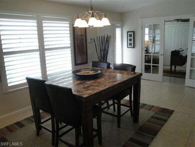 Large dining area with custom chandelier.